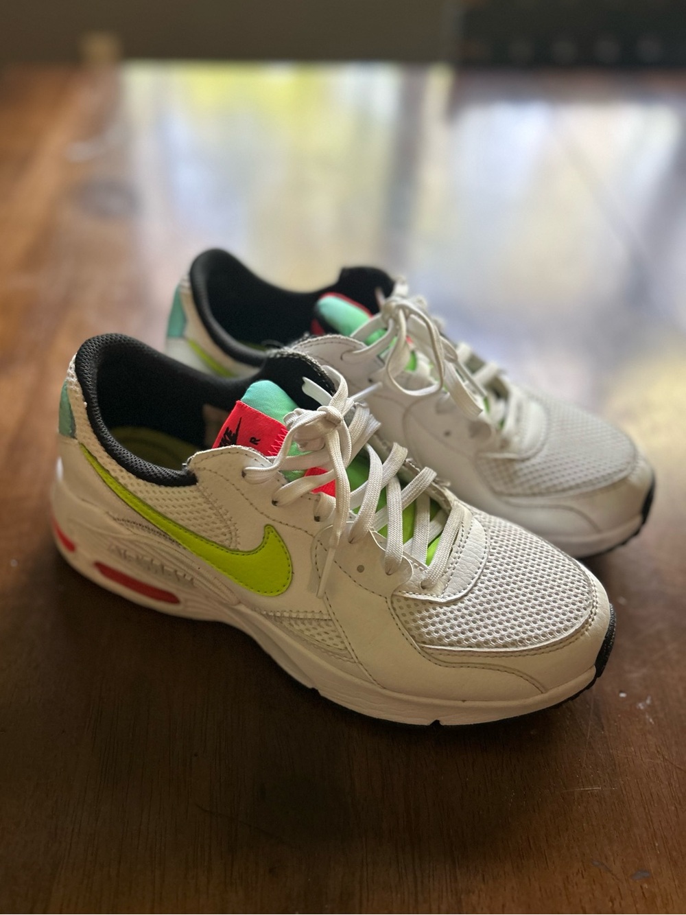 Nike White Athletic Sneakers with Neon Green Swoosh